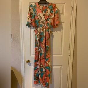 Peach, cream & gold chain cutout jumper with open back.  Super cute!